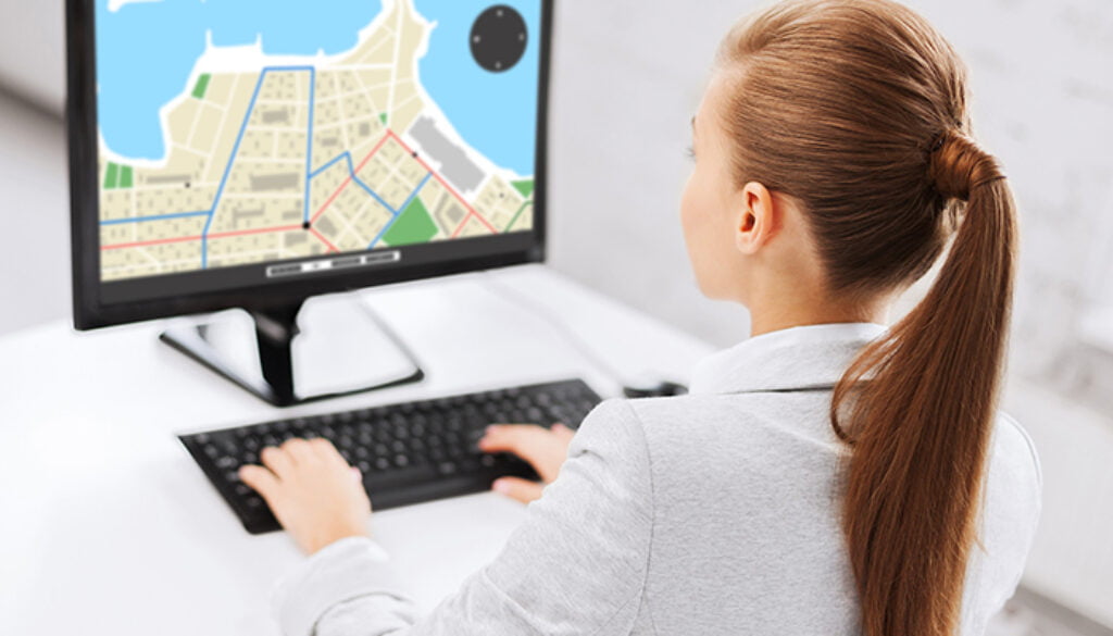 businesswoman with gps navigator map on computer